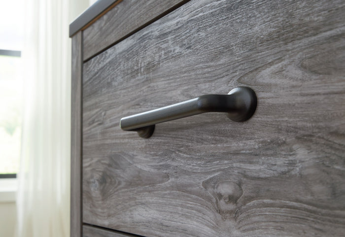 Bronyan - Dark Gray - Four Drawer Chest by Signature Design by Ashley® | Bel Furniture