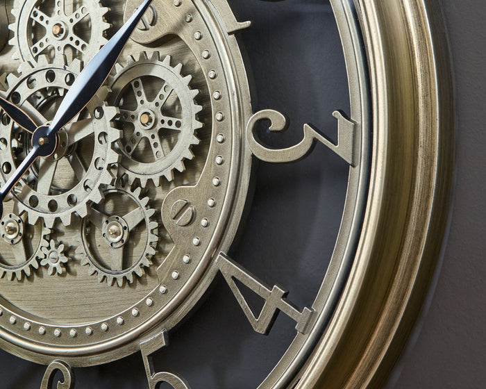 Gilover - Champagne Finish - Wall Clock by Signature Design by Ashley® | Bel Furniture