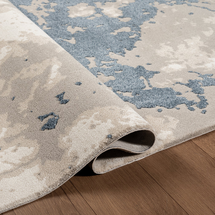 .Uma Blue Power-Loomed Area Rug - 6' 6" x 9' 0"